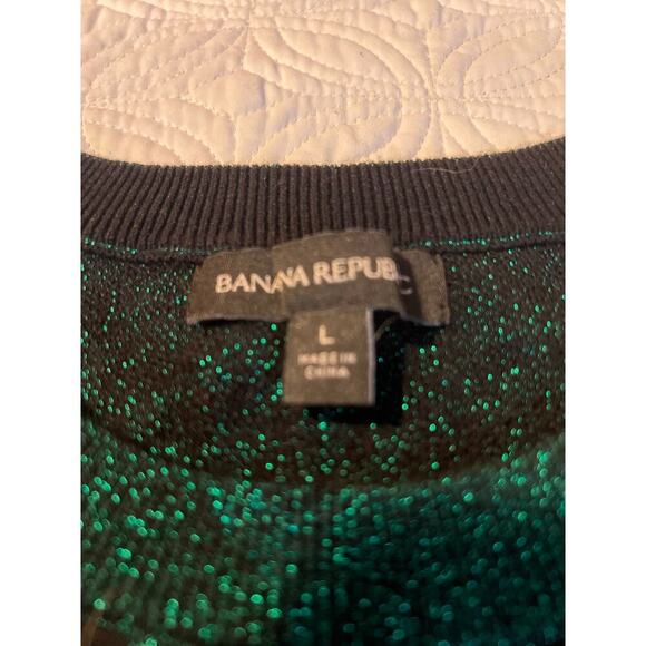 Metallic green animal print sweater from loft
Excellent condition
Size large - Picture 4 of 8